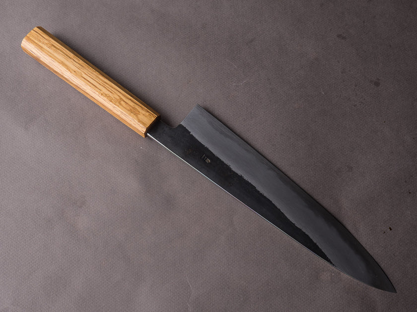 Slice your way through meal prep with the Kurouchi Chef Knife by