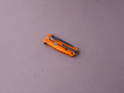 lionSTEEL - SOLID Folding Knife - SR22 - Sleipner - 75mm - Frame Lock - Orange Aluminum - Black Mil Spec