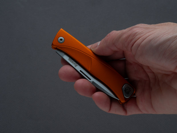 lionSTEEL - SOLID Folding Knife - Thrill - Slip Joint - M390 - 75mm - Orange Aluminum - H. WAYL Clip