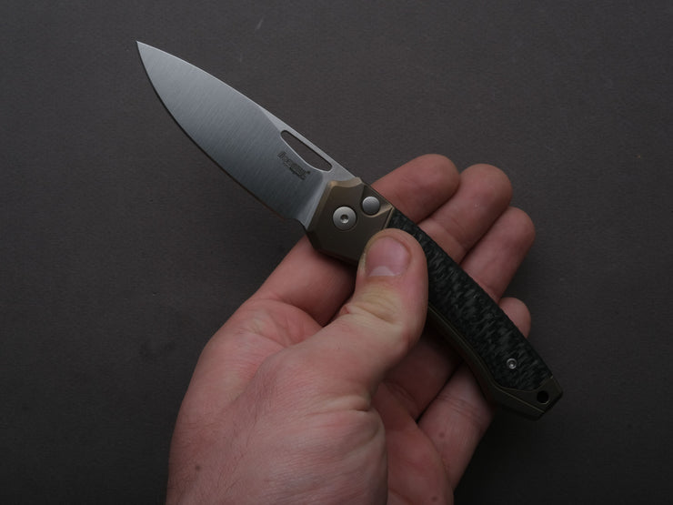 lionSTEEL - Folding Knife - Button Lock - Twain - MagnaCut - 80mm - Bronze Titanium Handle w/ Carbon Fiber Inlay