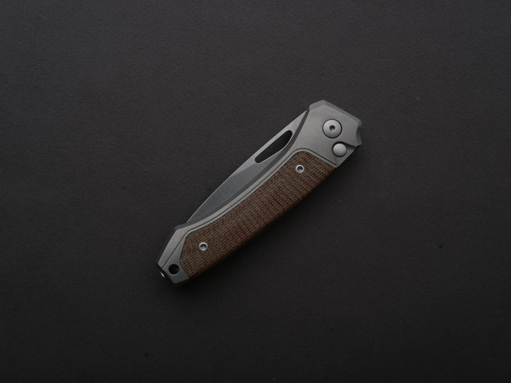 lionSTEEL - Folding Knife - Button Lock - Twain - MagnaCut - 80mm - Titanium Handle w/ Natural Canvas Inlay