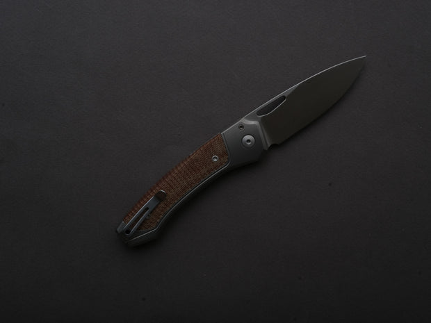 lionSTEEL - Folding Knife - Button Lock - Twain - MagnaCut - 80mm - Titanium Handle w/ Natural Canvas Inlay