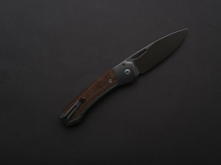 lionSTEEL - Folding Knife - Button Lock - Twain - MagnaCut - 80mm - Titanium Handle w/ Natural Canvas Inlay