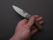 lionSTEEL - Folding Knife - Button Lock - Twain - MagnaCut - 80mm - Titanium Handle w/ Natural Canvas Inlay