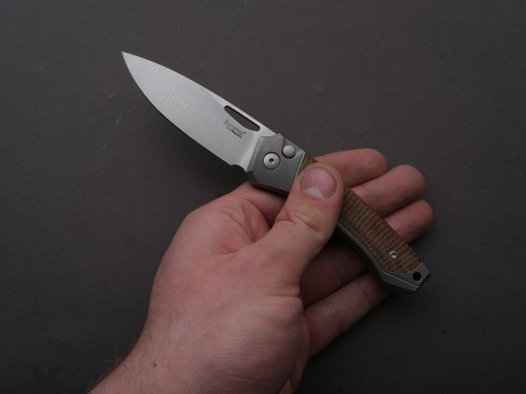 lionSTEEL - Folding Knife - Button Lock - Twain - MagnaCut - 80mm - Titanium Handle w/ Natural Canvas Inlay